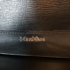 MAX MARA Black leather handbag w/cross body strap.